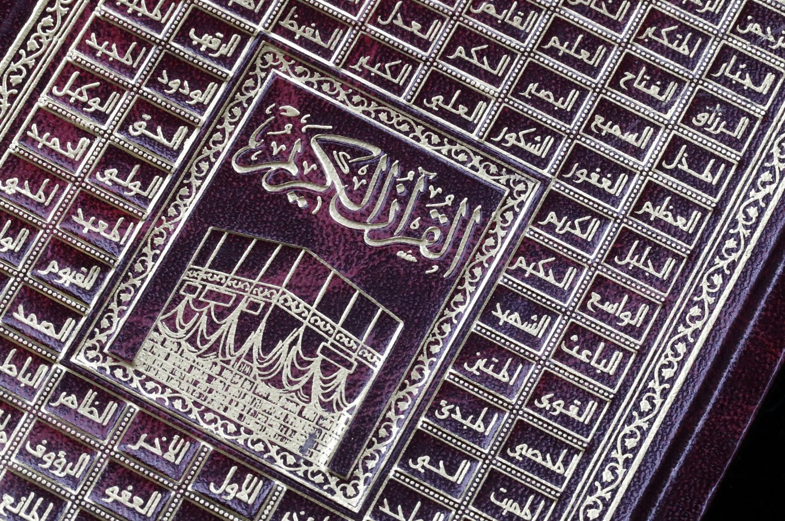 The cover of a Quran adorned with &quot;al-Asma al-Husna,&quot; 99 names of Allah. (Getty Images Photo)