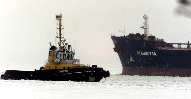 The Greek-registered ship Stemnitsa (R) with 100,000 tons of crude oil on board leaves the Russian port of Primorsk, Feb. 5, 2003. (Reuters File Photo)