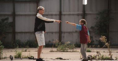 A still shot taken from &quot;Scrapper&quot; shows Harris Dickinson and Lola Campbell.