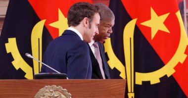 French President Emmanuel Macron (L) and Angola&#039;s President Joao Lourenco leaves the stage after a press conference at the Casa Rosada presidential palace, in Luanda, Angola, March 3, 2023. (AFP Photo)