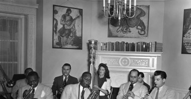 Photo of Nesuhi Ertegün, Rex Stewart (trumpet), Harry Carney (baritone), Adele Girard (harp), Barney Bigard (clarinet), Joe Marsala (clarinet) at the Turkish Embassy in Washington, U.S., Jan. 1, 1940. (Photo of Nesuhi Ertegün)