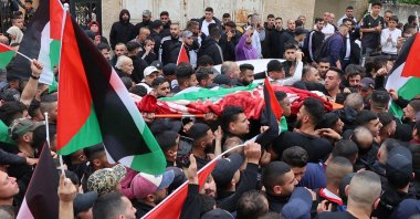 Palestinian mourners carry the body of Amir Imad Abu Khadija, who was killed in an Israeli raid in Tulkarm, occupied West Bank, Palestine, March 23, 2023. (AFP Photo)