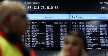 A view of timetables showing canceled flights as airport workers protest at Cologne Bonn Airport during a strike called by German trade union Verdi in Cologne, Germany, Feb. 27, 2023. (Reuters File Photo)