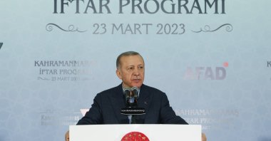 President Recep Tayyip Erdoğan, speaks at an iftar (fast-breaking meal) at the Karacasu container compound for earthquake survivors in Kahramanmaraş province, March 23, 2023. (AA Photo)