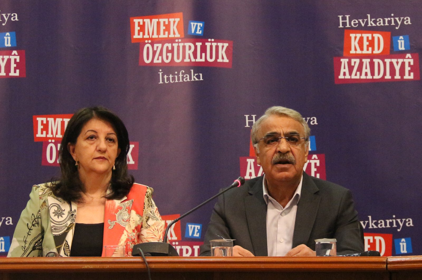 The Peoples’ Democratic Party (HDP) co-Chairs Pervin Buldan (L) and Mithat Sancar (R) hold a press conference at the World Trade Center in Istanbul, Türkiye, March 22, 2023. (AA Photo)