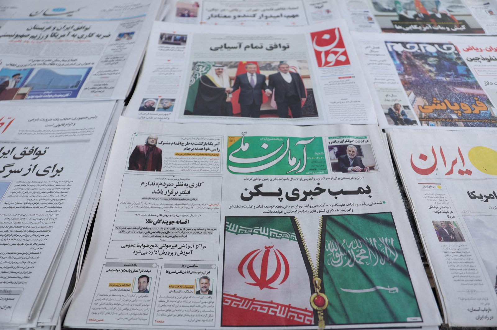 A newspaper with a cover picture of the flag of Iran and Saudi Arabia is seen in Tehran, Iran, March 11, 2023. (Reuters Photo)
