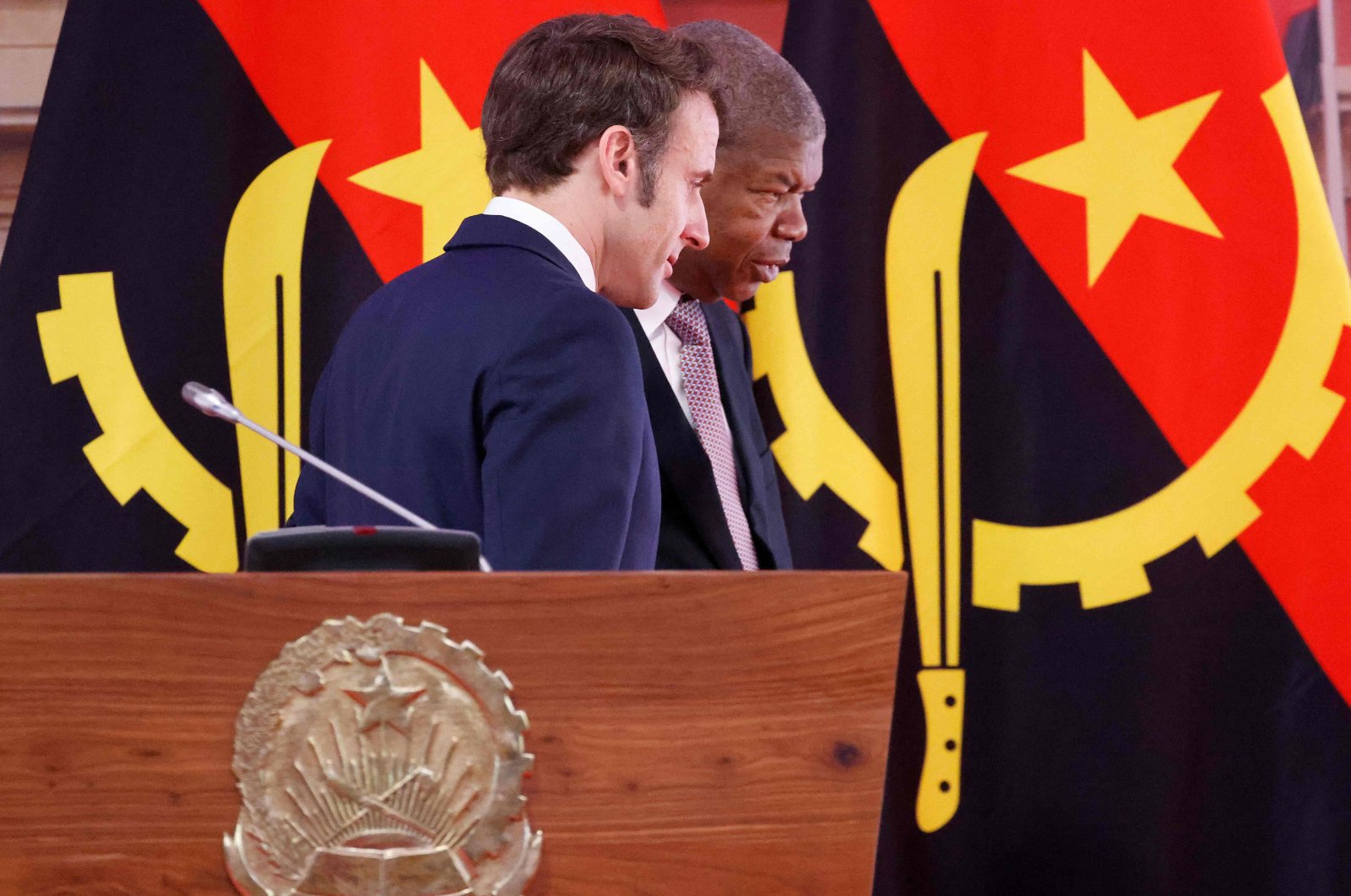 French President Emmanuel Macron (L) and Angola&#039;s President Joao Lourenco leaves the stage after a press conference at the Casa Rosada presidential palace, in Luanda, Angola, March 3, 2023. (AFP Photo)