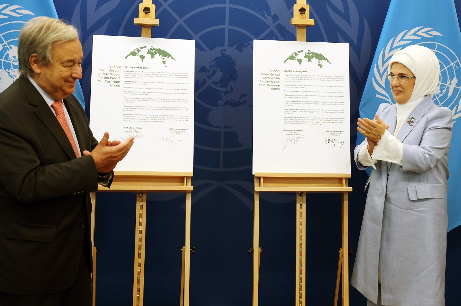 First lady Emine Erdoğan and U.N. Secretary General Antonio Guterres pose in front of goodwill agreement, New York, U.S., Sept. 19, 2022. (AA Photo)