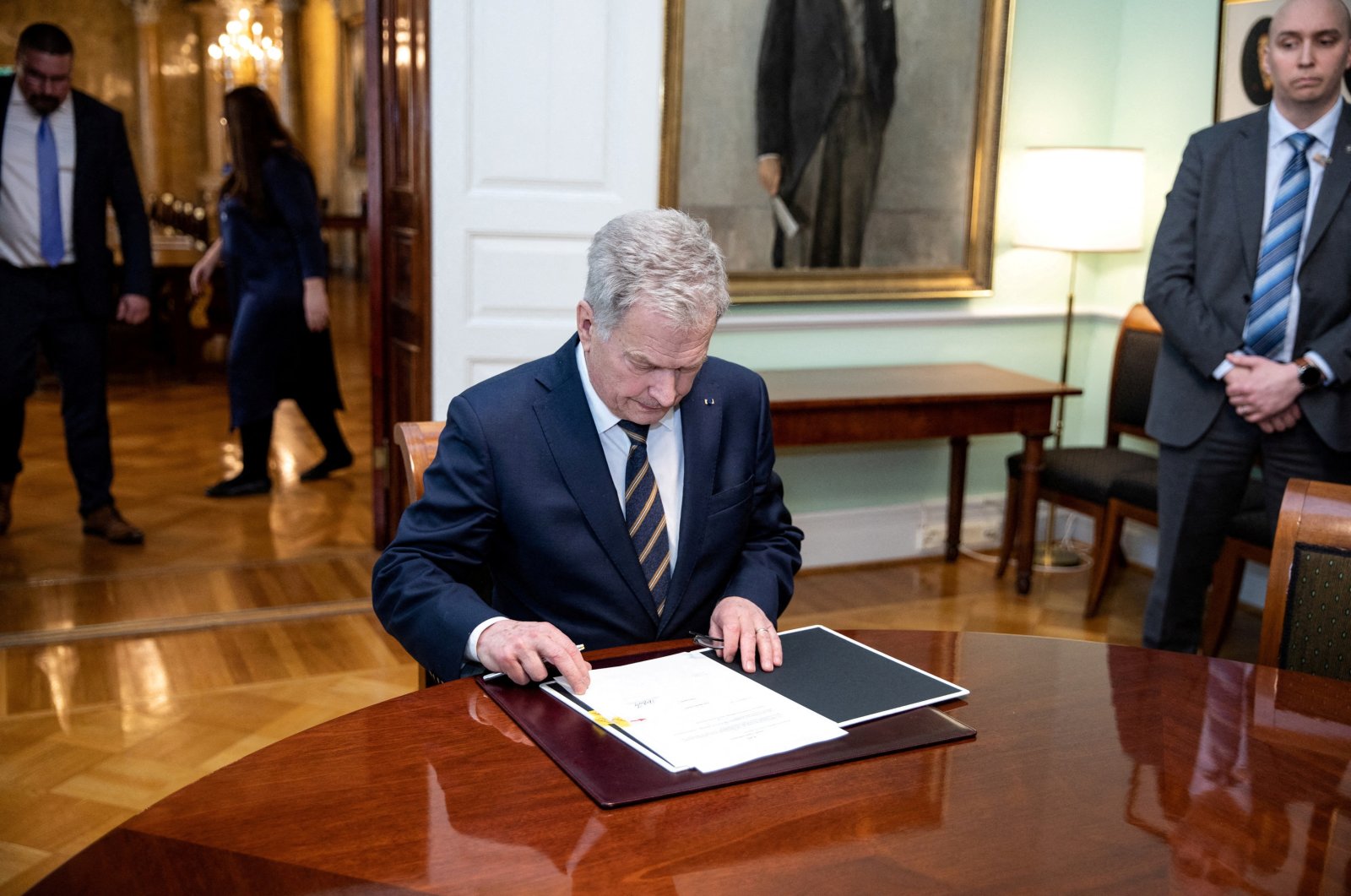 Finnish President Sauli Niinisto attends a meeting to sign Finland&#039;s national NATO legislation in Helsinki, Finland, March 23, 2023. ( Reuters Photo)