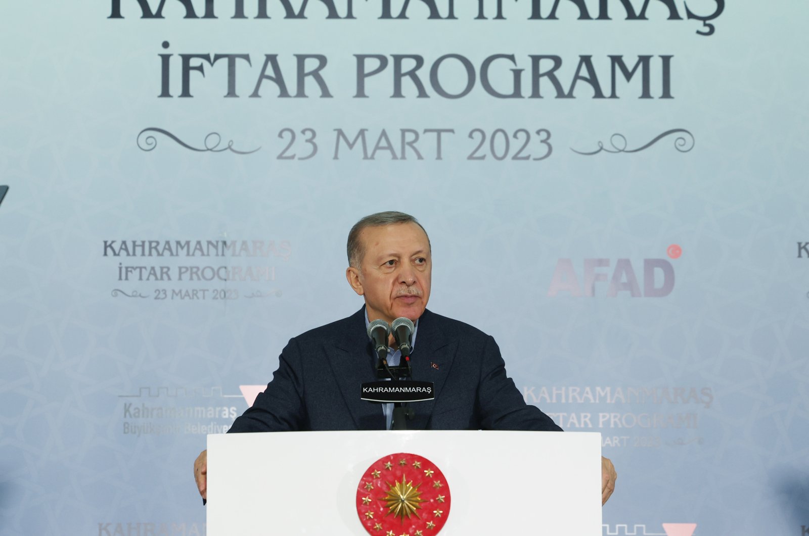 President Recep Tayyip Erdoğan, speaks at an iftar (fast-breaking meal) at the Karacasu container compound for earthquake survivors in Kahramanmaraş province, March 23, 2023. (AA Photo)
