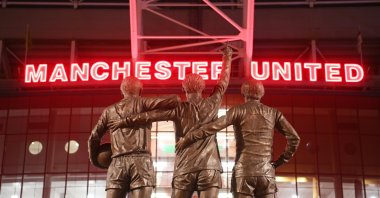 A general view of the Trinity Statue on the outside of the stadium of Sir Bobby Charlton, George Best and Denis Law prior to the Premier League match between Manchester United and Leeds United at Old Trafford, Manchester, U.K., Feb. 8, 2023. (Getty Photo)