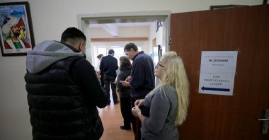 People wait for voting at a polling station set up for Bulgarian elections in Edirne, northwestern Türkiye, Oct. 2, 2022. (AA Photo) 