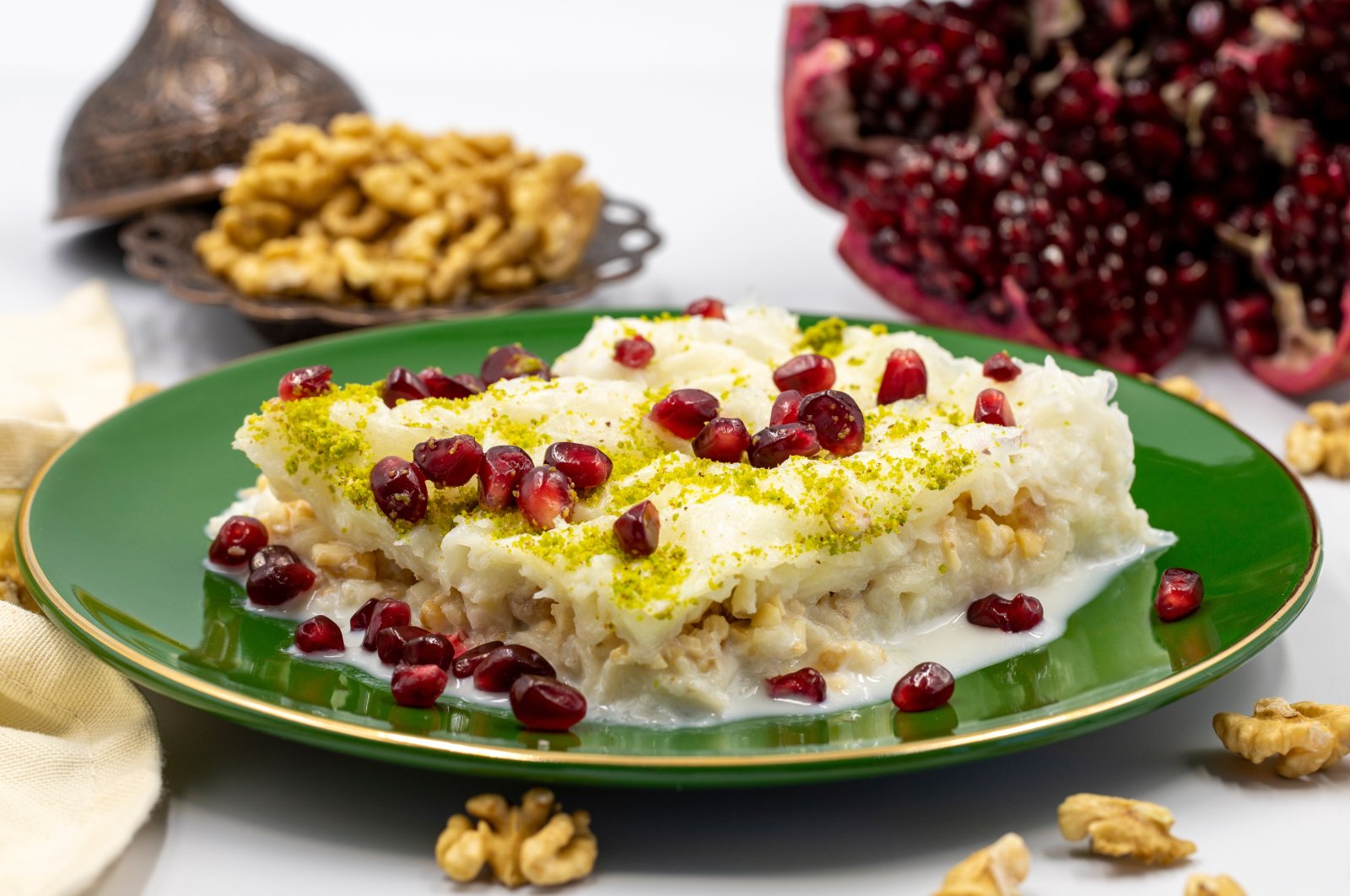 Very popular during Ramadan, Güllaç is a traditional chilled Turkish dessert made with delicate sheets of pastry. (Shutterstock Photo)