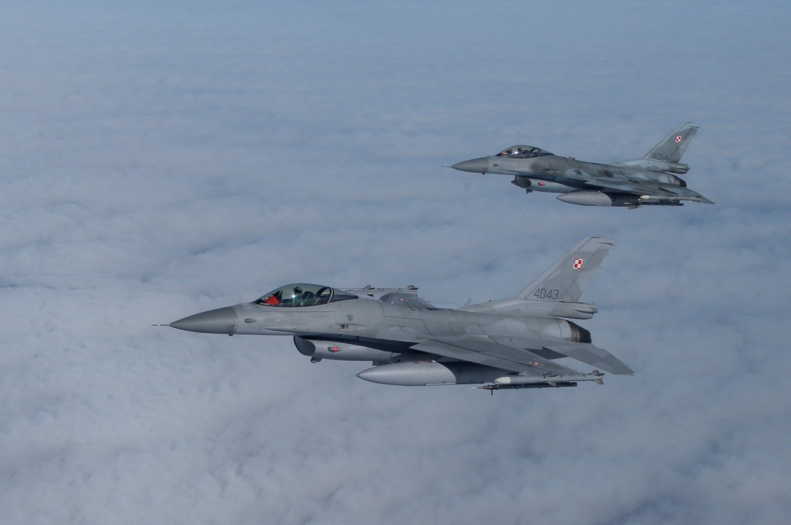 F-16 aircraft fly during a NATO media event at an airbase in Malbork, Poland, March 21, 2023. (Reuters Photo)