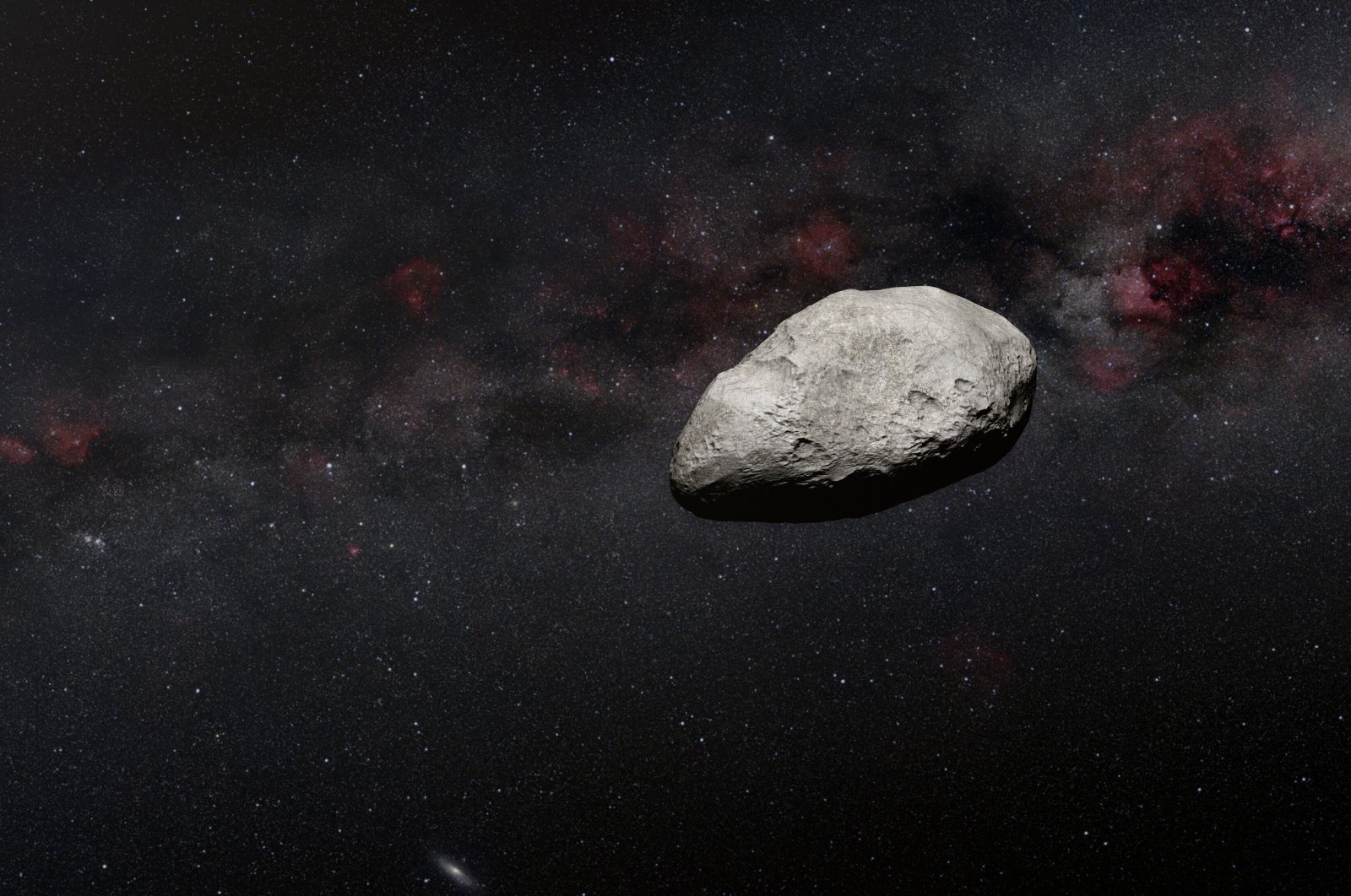 A handout artist&#039;s impression released on March 24, 2023, by the European Space Agency (ESA) shows a grey, irregularly-shaped asteroid, rocky objects that often pass safely past Earth. (Photo by Handout / European Space Agency / AFP) 
