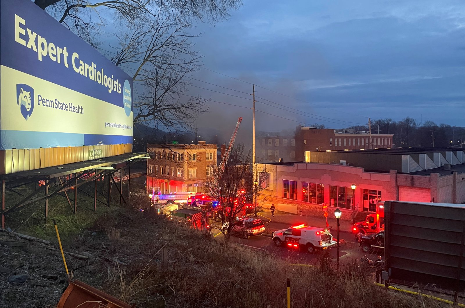 A general view shows smoke coming out from a chocolate factory after fire broke out, in West Reading, Pennsylvania, U.S., March 24, 2023, in this picture obtained from social media. (Twitter @Based_In410/via Reuters)