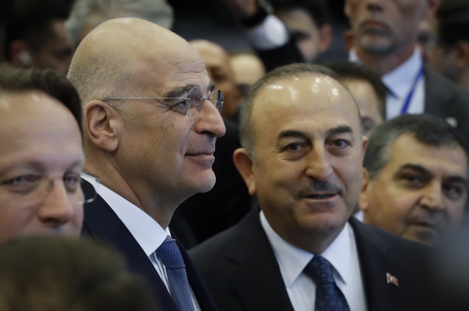 Foreign Minister Mevlüt Çavuşoğlu and Greek Foreign Minister Nikos Dendias stand together at the opening of an international donors&#039; conference in support of the people in earthquake stricken regions in Türkiye and Syria, in Brussels, Belgium, March 20, 2023. (EPA File Photo)