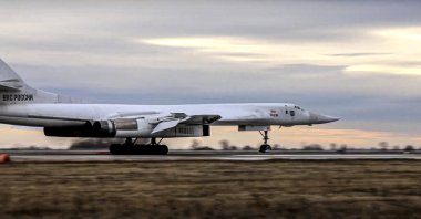 A Russian long-range Tu-160 bomber lands after patrolling in the airspace of Belarus at an airfield in Russia, Nov. 11, 2021. (AP Photo)