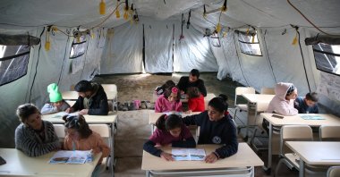 Students are seen along with volunteer teachers in Yeşilyurt district of Malatya, Türkiye, March 26, 2023. (AA Photo)