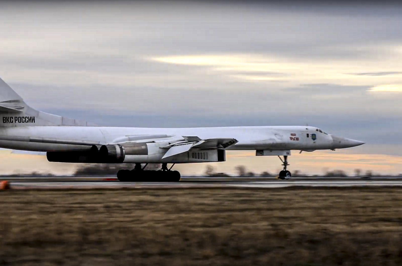 A Russian long-range Tu-160 bomber lands after patrolling in the airspace of Belarus at an airfield in Russia, Nov. 11, 2021. (AP Photo)