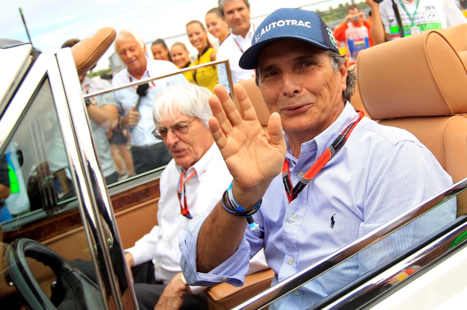 Former F1 driver Nelson Piquet of Brazil (R) and F1 boss Bernie Ecclestone at the Hungarian GP, Budapest, Hungary, July 26, 2015. (Reuters Photo)