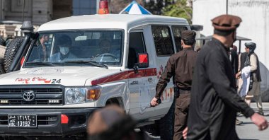 An ambulance carries victims from near the site of a bomb attack in Kabul, Afghanistan, March 27, 2023. (AFP Photo)