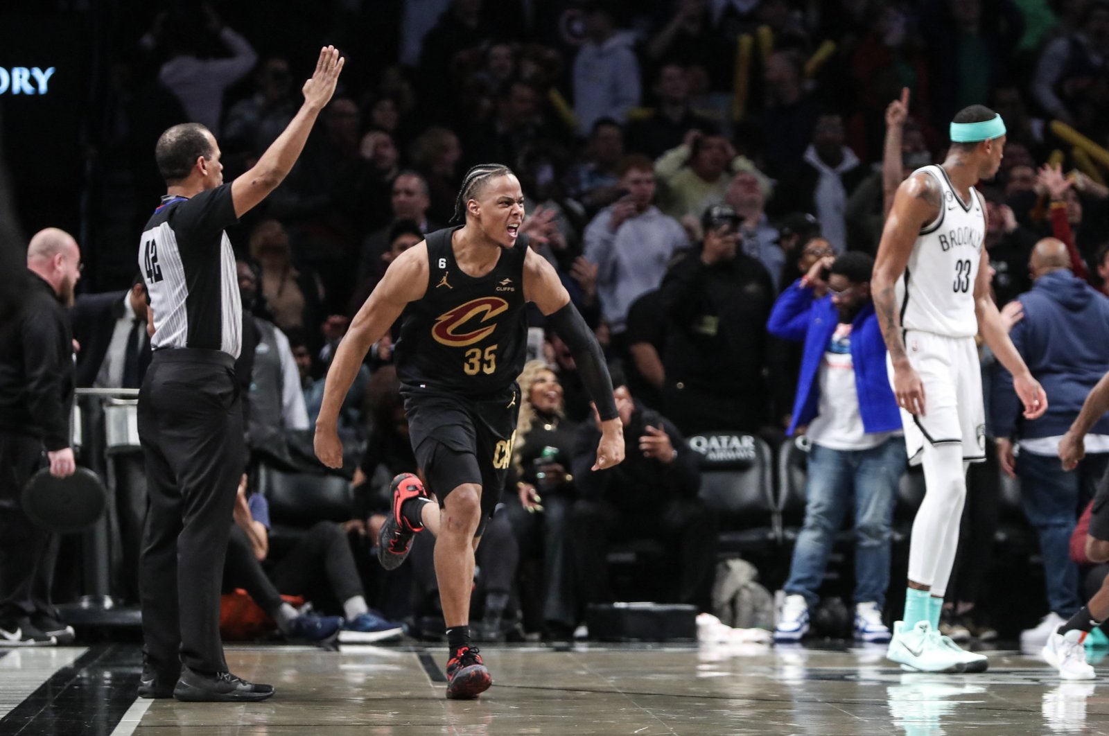 Cleveland Cavaliers forward Isaac Okoro (C) celebrates after scoring the game winning basket to beat the Brooklyn Nets 116-114 at Barclays Center, Brooklyn, US, March 23, 2023. (Reuters Photo)