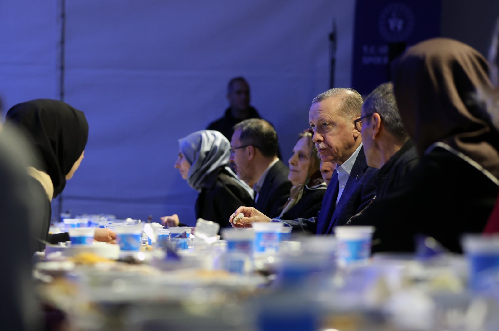President Recep Tayyip Erdoğan is seen at a dinner with earthquake victims in Istanbul, a special iftar fast-breaking meal for the holy Islamic month of Ramadan, Türkiye, March 26, 2023 (AA Photo)