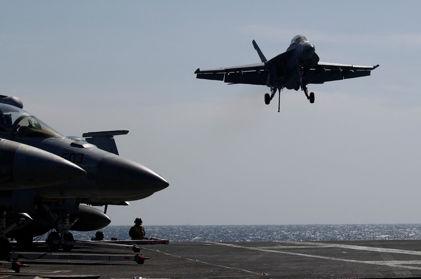 A U.S. Navy F-18 Super Hornet lands on the flight deck of the USS Nimitz, off the coast of Busan, South Korea, March 27, 2023. (Reuters Photo)