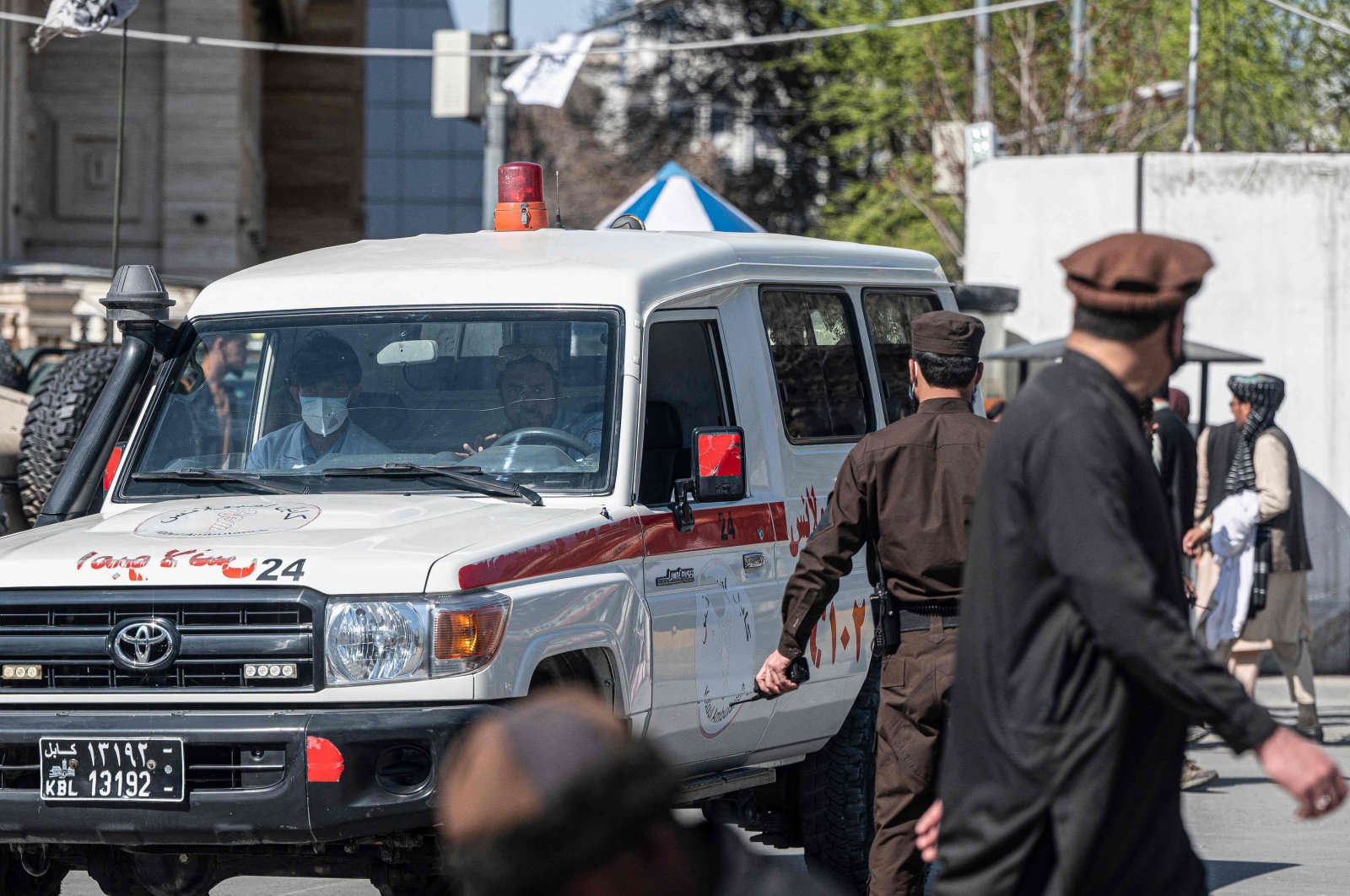 An ambulance carries victims from near the site of a bomb attack in Kabul, Afghanistan, March 27, 2023. (AFP Photo)