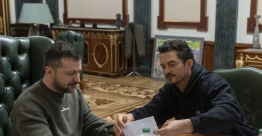 The Ukrainian Presidential Press Service shows Ukrainian President Volodymyr Zelensky (L) with British actor and UNICEF Goodwill Ambassador Orlando Bloom (R) during their meeting in Kyiv, Ukraine, March 26, 2023. (EPA Photo)