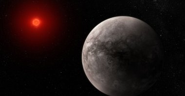 An illustration depicts what the exoplanet TRAPPIST-1 b could look like. (AP Photo)