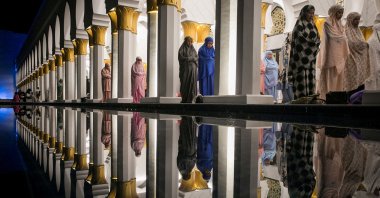 Muslim women attend mass prayers during the first evening of the holy fasting month of Ramadan at Sheikh Zayed Grand mosque in Solo, Central Java, Indonesia, March 22, 2023. (Reuters Photo)
