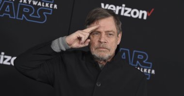 Mark Hamill salutes as he arrives at the world premiere of "Star Wars: The Rise of Skywalker" in Los Angeles, U.S., Dec. 16, 2019. (AP Photo)