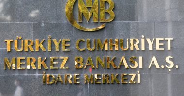 A logo of the Central Bank of the Republic of Türkiye (CBRT) at the entrance of its headquarters in Ankara, Türkiye, Oct. 15, 2021. (Reuters Photo)