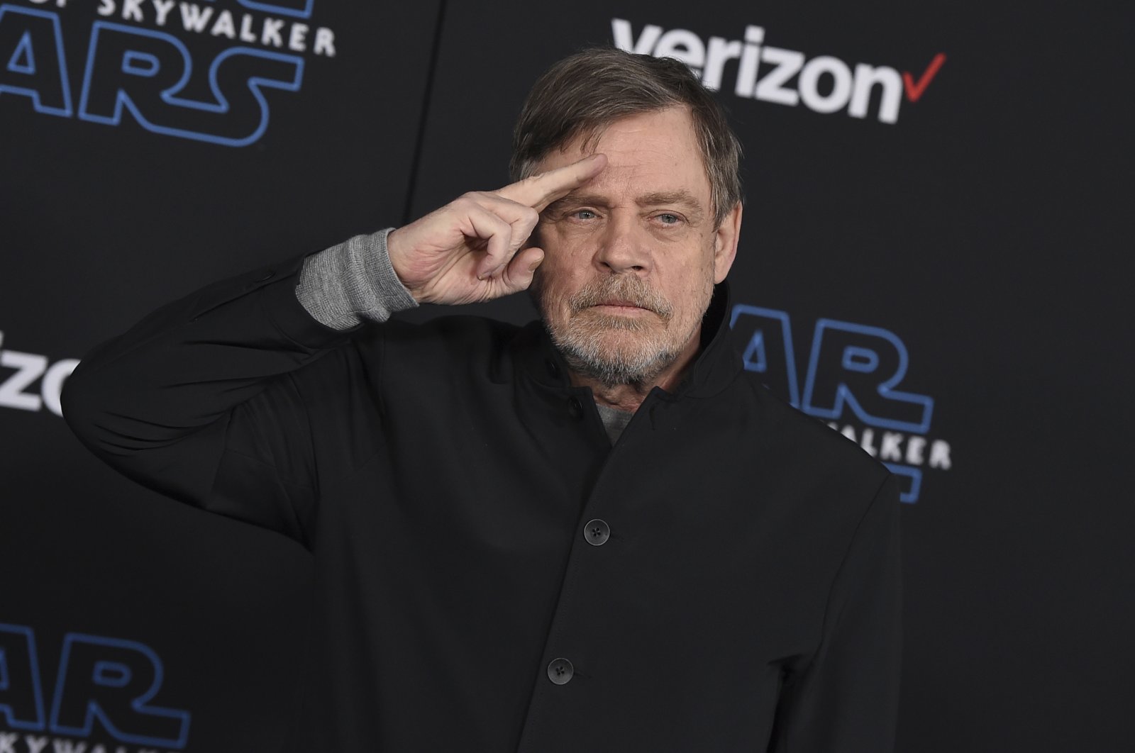 Mark Hamill salutes as he arrives at the world premiere of "Star Wars: The Rise of Skywalker" in Los Angeles, U.S., Dec. 16, 2019. (AP Photo)