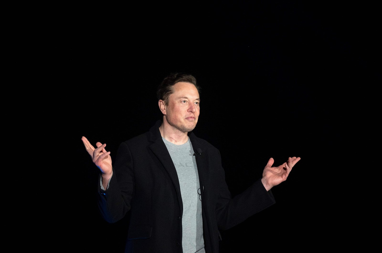 Elon Musk gestures as he speaks during a press conference at SpaceX&#039;s Starbase facility near Boca Chica Village in South Texas, U.S., Feb. 10, 2022. (AFP Photo)