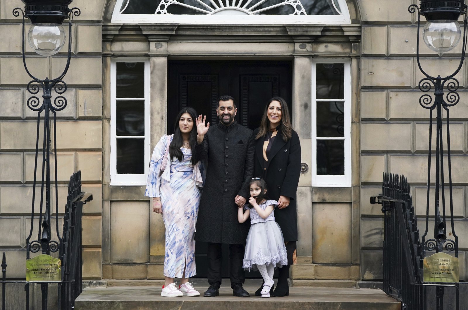 Humza Yousaf (C) with his wife Nadia el-Nakla, daughter Amal, 3, and step-daughter Maya (L) pose for a photo, at Bute House, Edinburgh, Scotland, March 29, 2023. (AP Photo)