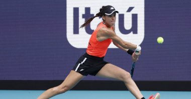 Romania's Sorana Cirstea hits a backhand against Aryna Sabalenka (not pictured) in a women's singles quarterfinal on day ten of the Miami Open at Hard Rock Stadium, Miami, US., March 29, 2023. (Reuters Photo)