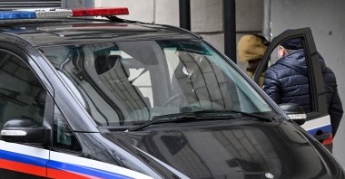 Evan Gershkovich, a Wall Street Journal reporter detained in Russia on suspicion of spying for the U.S., is escorted out of the Lefortovsky court in Moscow, Russia, March 30, 2023. (AFP Photo)