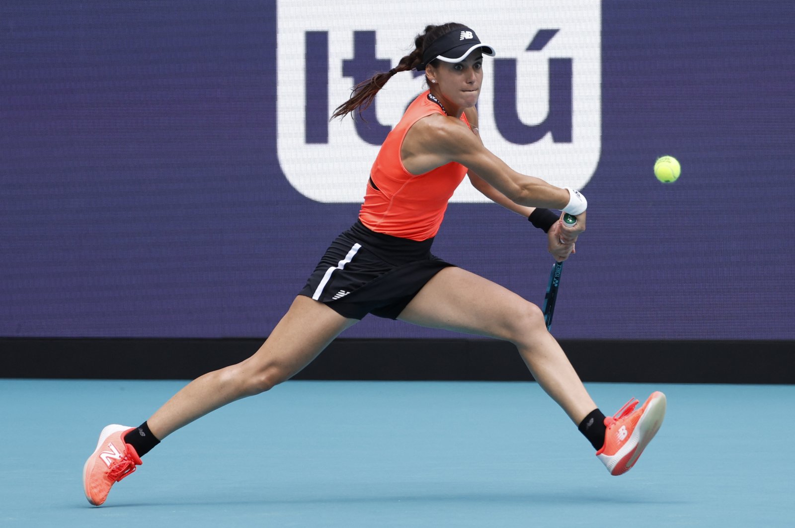 Romania&#039;s Sorana Cirstea hits a backhand against Aryna Sabalenka (not pictured) in a women&#039;s singles quarterfinal on day ten of the Miami Open at Hard Rock Stadium, Miami, US., March 29, 2023. (Reuters Photo)