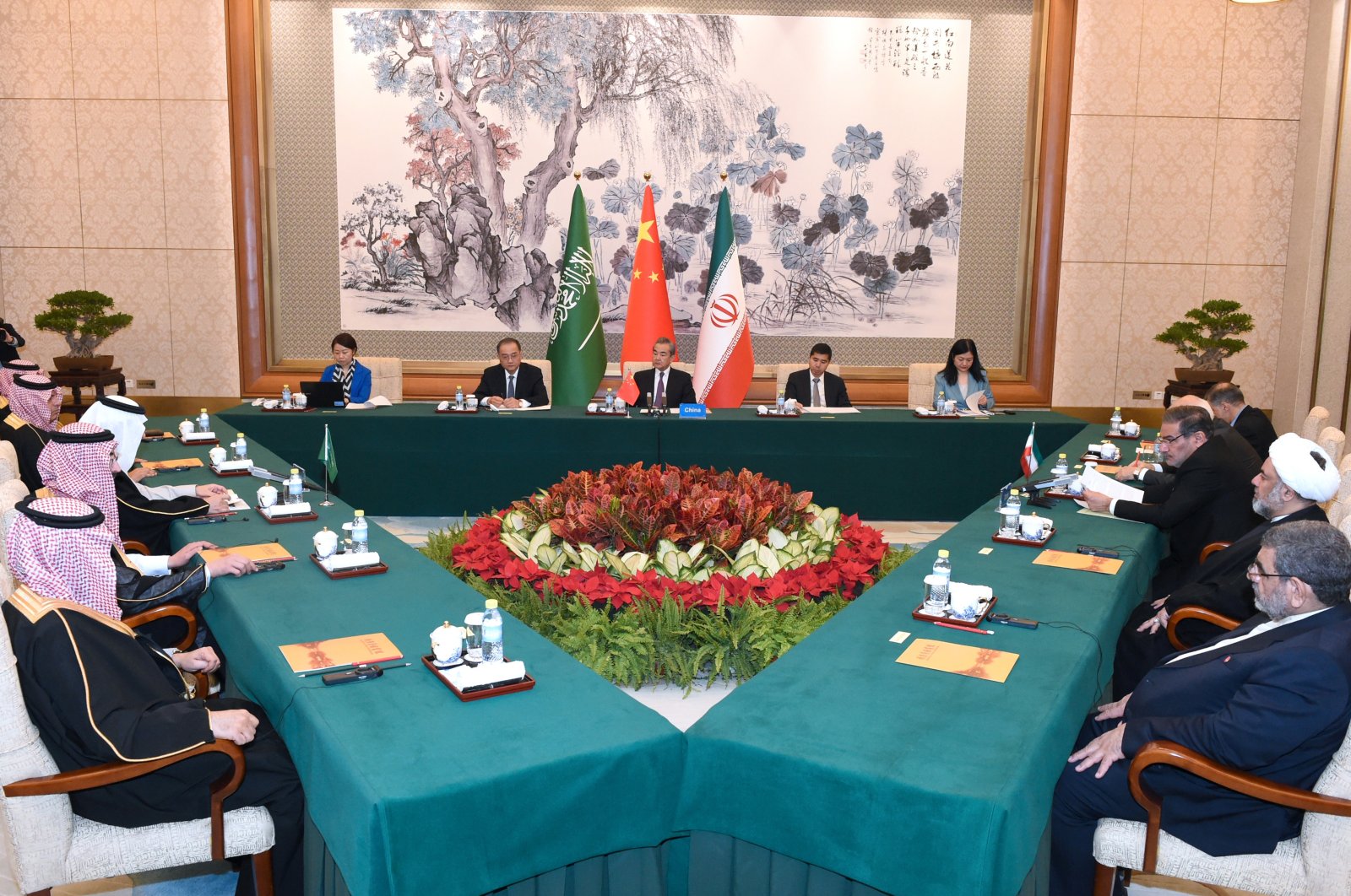 Wang Yi, a member of the Political Bureau of the Communist Party of China (CPC) Central Committee and director of the Office of the Foreign Affairs Commission of the CPC Central Committee, presides over the closing meeting of the talks between a Saudi delegation and an Iranian delegation in Beijing, China, March 10, 2023. (AP Photo)