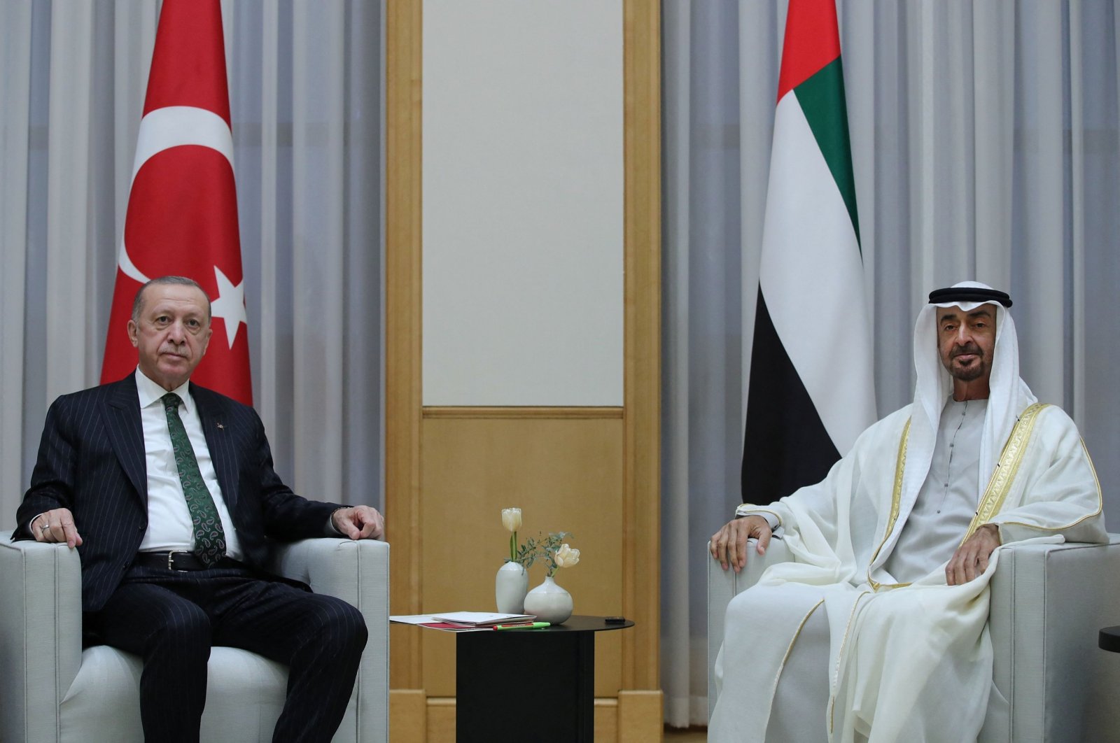This handout picture released on Feb. 14, 2022, by the Turkish Presidential Office shows President Recep Tayyip Erdoğan (L) meeting with Abu Dhabi Crown Prince Sheikh Mohammed bin Zayed Al Nahyan during an official ceremony in Abu Dhabi, UAE. (AFP Photo)