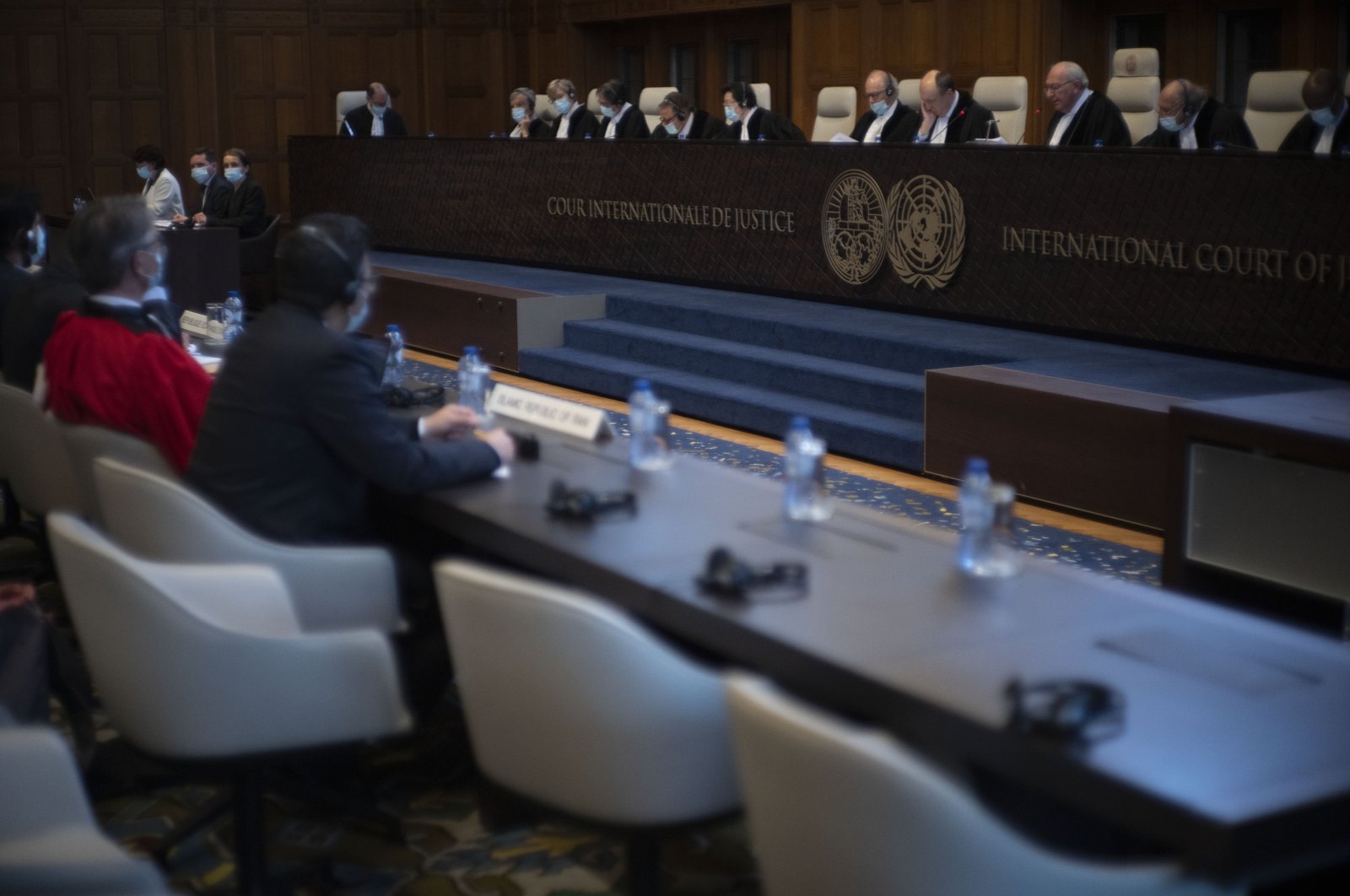 Judge and vice president Kirill Gevorgian of Russia (3rd Right), starts reading the verdict of The International Court of Justice, the United Nations&#039; top court, which issued its judgment in a dispute between Iran and the United States over frozen Iranian state bank accounts worth some $2 billion, in The Hague, Netherlands, March 30, 2023. (AP Photo)