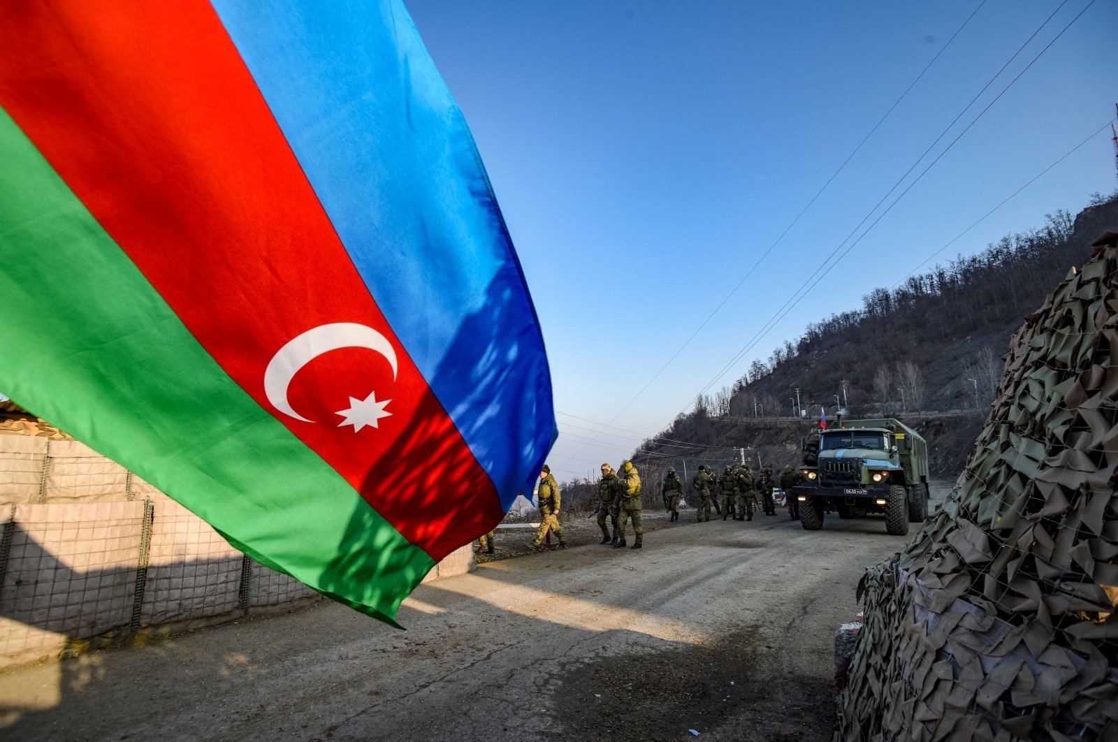 Russian peacekeepers are seen deployed at the Lachin corridor in Karabakh, as Azerbaijani environmental activists protest illegal mining, Azerbaijan, Dec. 26, 2022. (AFP Photo)