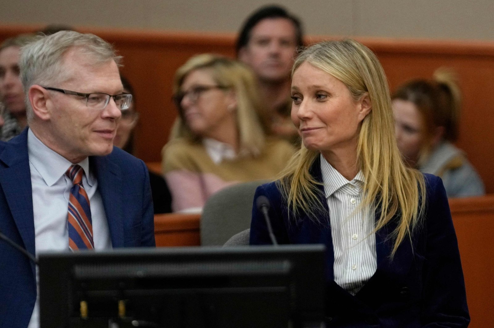 Actress Gwyneth Paltrow and her attorney Steve Owens smile after the reading of the verdict during her trial, in Park City, Utah, U.S., March 30, 2023. (AFP Photo)