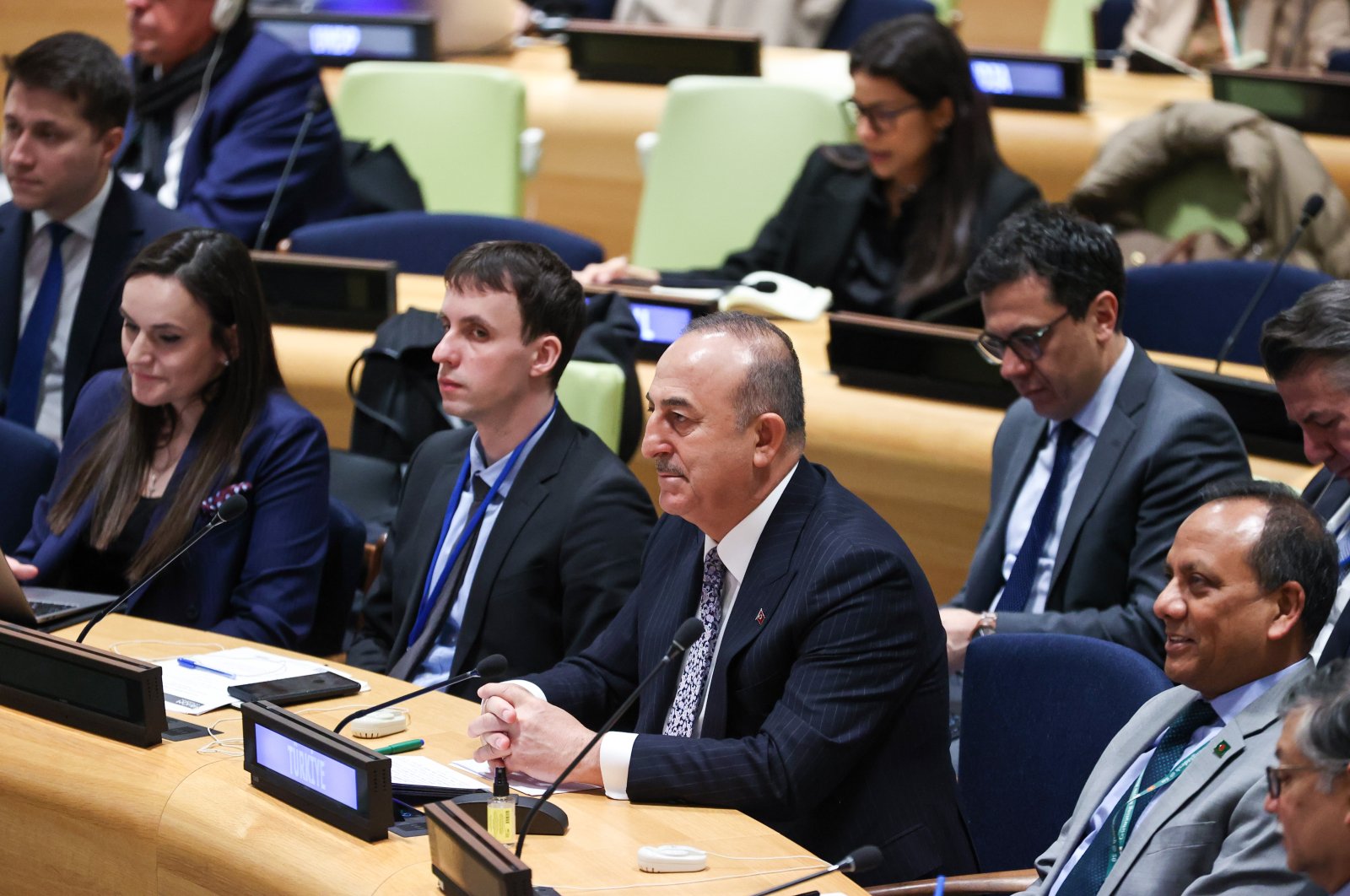 Türkiye’s Foreign Minister Mevlüt Çavuşoğlu (C) attends the International Migration Dialogue meeting at the UN Headquarters in New York, U.S., March 30, 2023. (AA Photo)