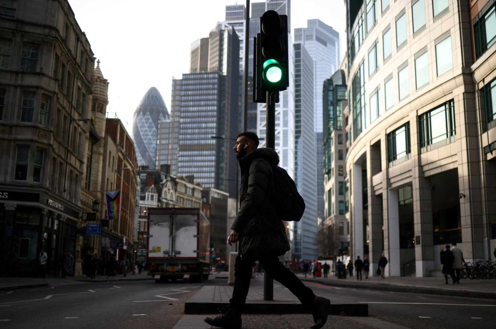 A person walks through the City of London financial district in London, Britain, Feb. 10, 2023. (Reuters Photo)