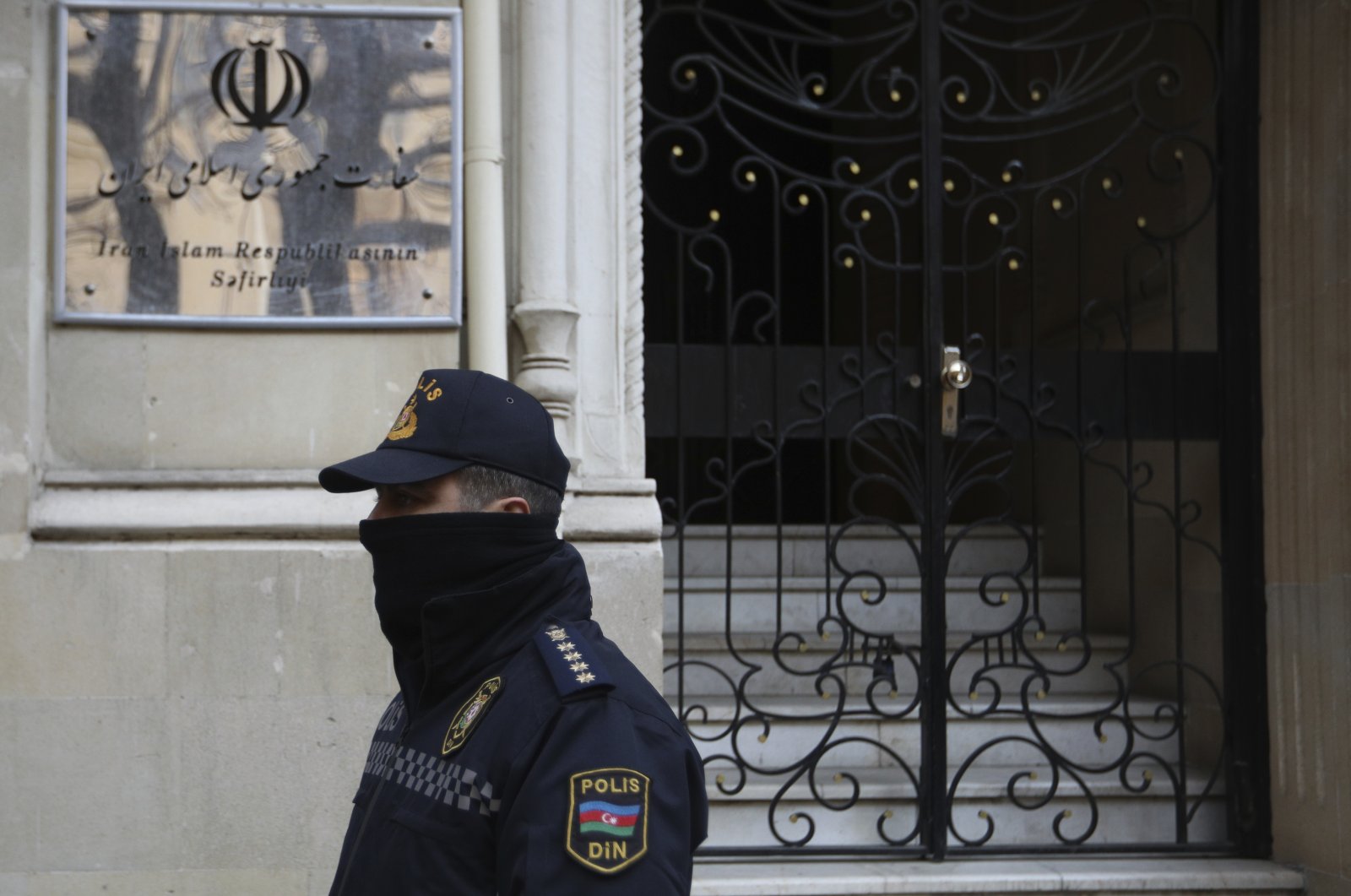 A police officer guards an area in front of the Iranian Embassy in Baku, Azerbaijan, Jan. 27, 2023. (AP File Photo)