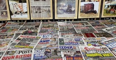 A collection of newspapers of past earthquakes are displayed in the exhibition, Kocaeli, Türkiye, April 2, 2023. (IHA Photo)